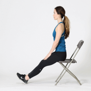 Woman sitting on chair performing Hamstring stretch
