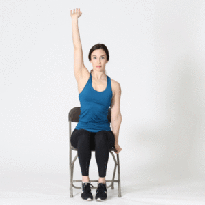 Woman in chair performing latissimus stretch