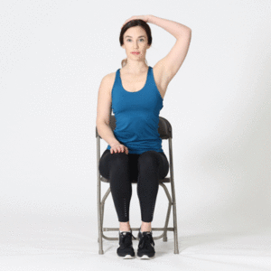Woman sitting on chair performing upper trap stretch