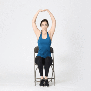 Woman in chair performing Upper body stretch
