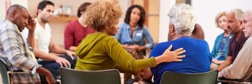 Elderly patients taking part in a support group